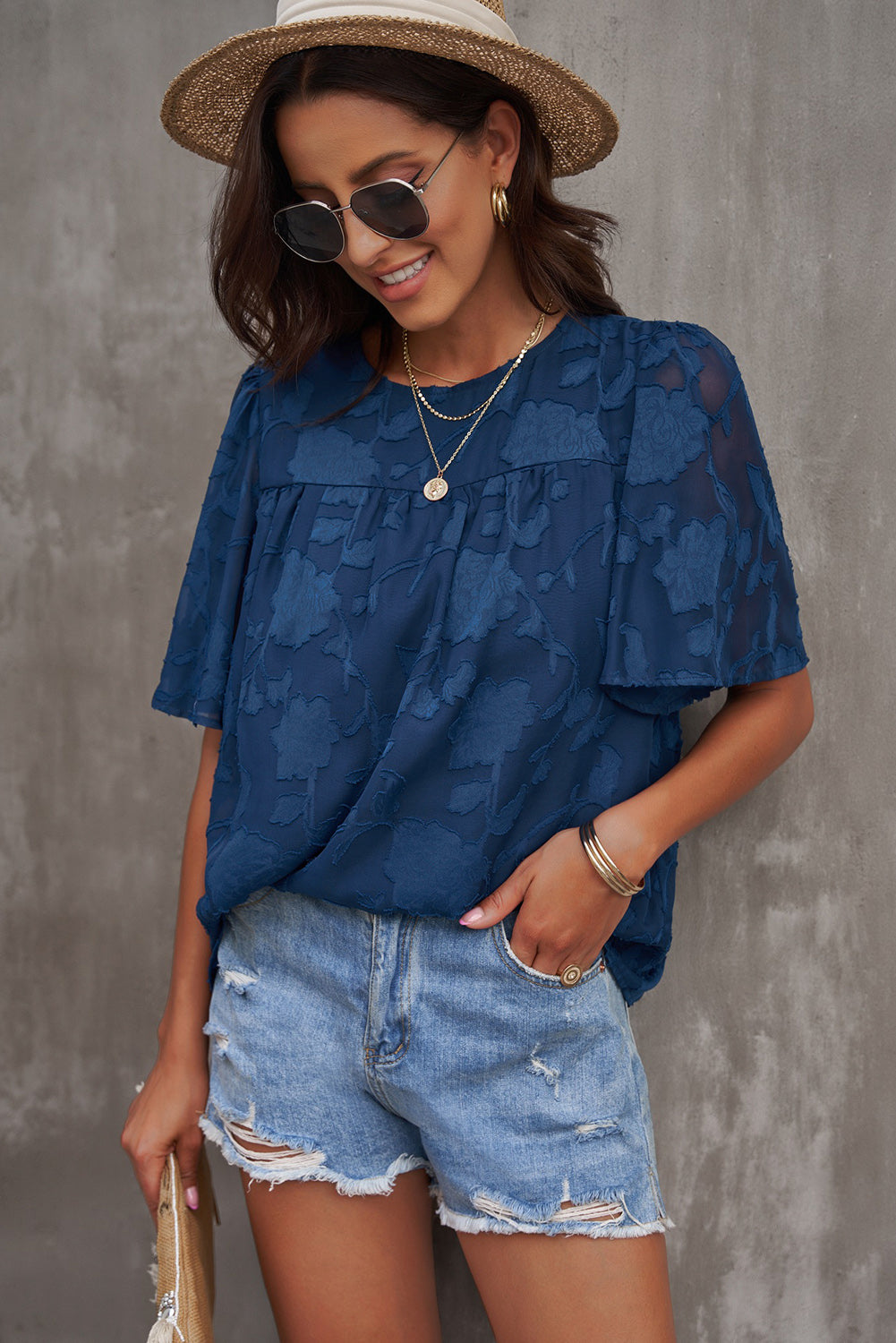 Blusa con cuello redondo y mangas abullonadas