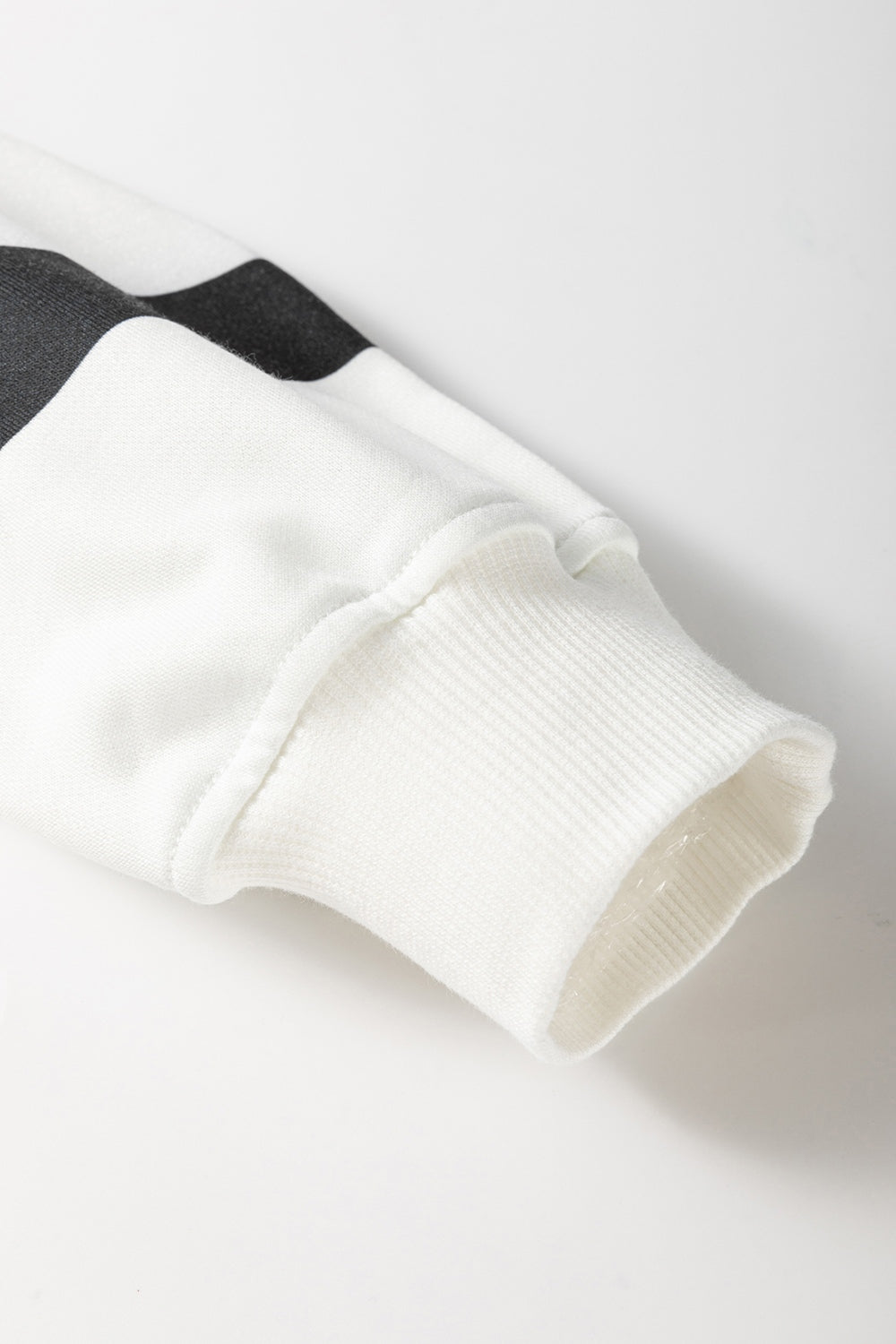 Conjunto de pantalón y top de manga larga con cuello redondo a rayas