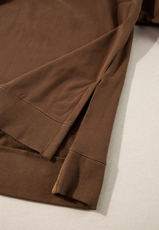 Conjunto de pantalón y top de manga larga con cuello redondo y abertura lateral