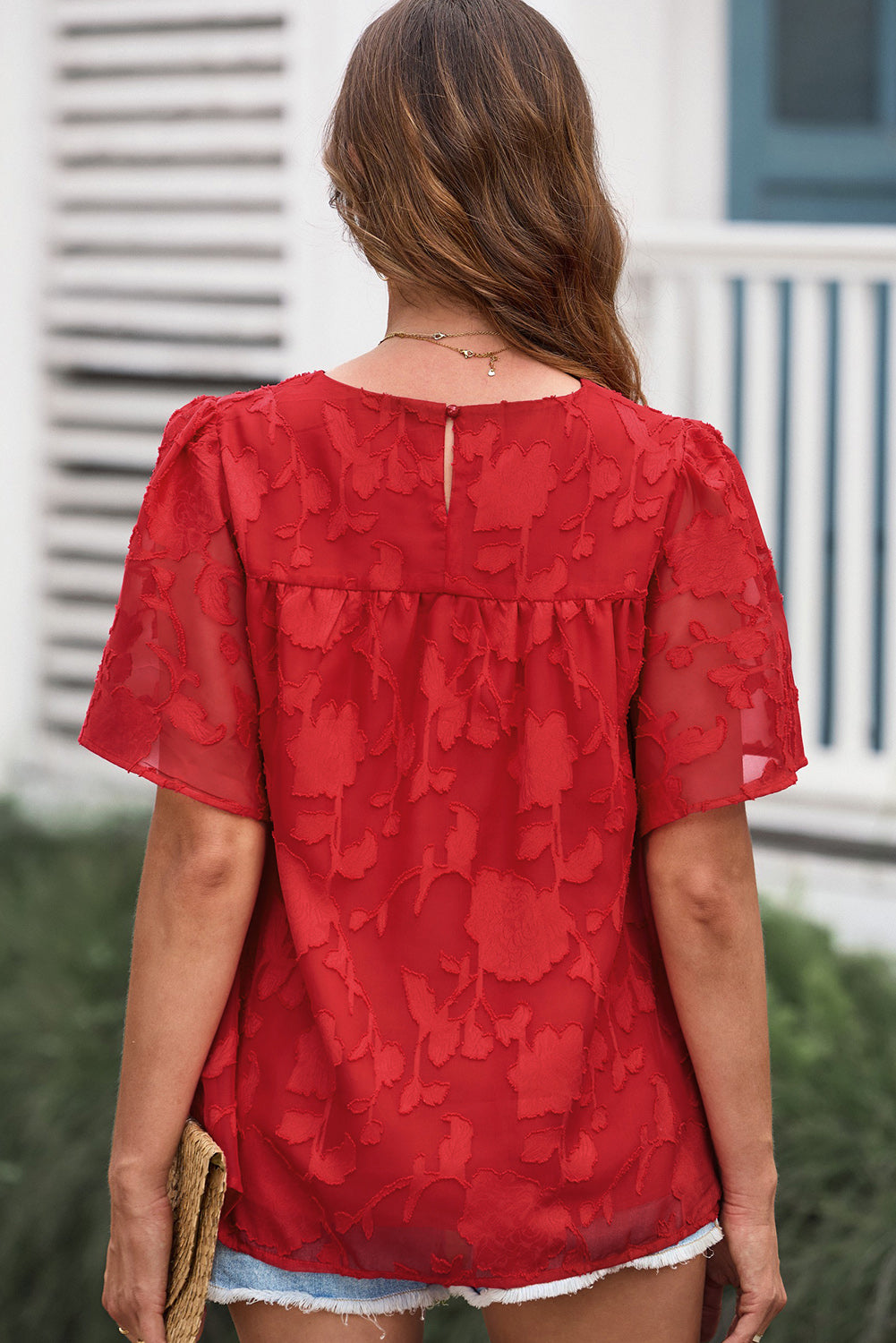Blusa con cuello redondo y mangas abullonadas